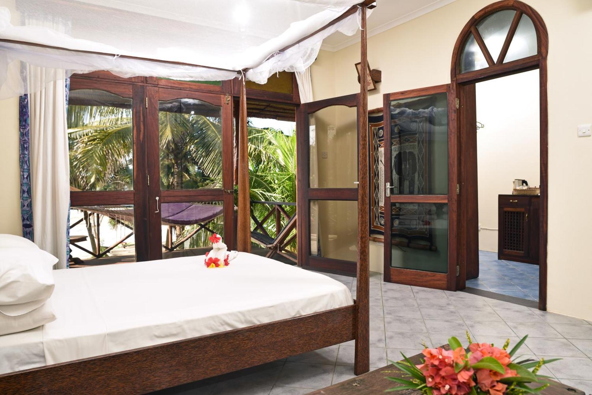 Mnarani Beach Cottages Нунгві Номер фото